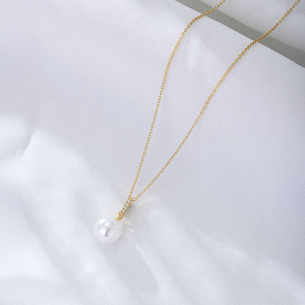 Timeless Elegance: 925 Silver Pearl Necklace with Zircon Bar and Round Pearl Pendant