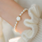 Sterling Silver Bracelet with White Natural Pearls and Shell Rose Pendant