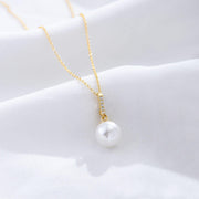 Timeless Elegance: 925 Silver Pearl Necklace with Zircon Bar and Round Pearl Pendant