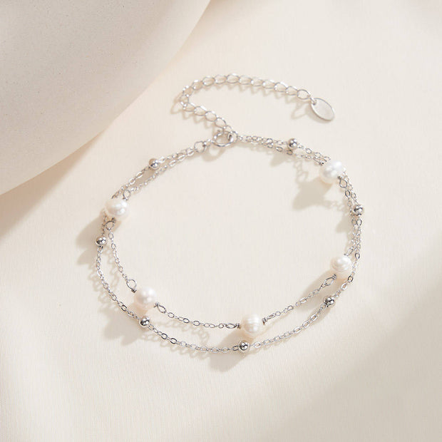 Sterling Silver Double Chain Bracelet with Freshwater Pearl and Gold-Plated Beads,